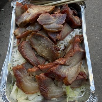 Long Island Dumplings - Roast pork on rice with cabbage and broth. - Dim Sum Near Me - New York, New York Long Island Dumplings - Roast pork on rice with cabbage and broth. - Dim Sum Near Me - New York, New York