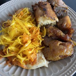 Anitas Restaurant - Pupusa (bean & cheese), corn tamale, plantains, meat on the side.