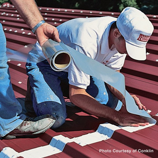 Slide of Troyer Commercial Roofing