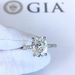 Izakov Fine Jewelry - Oval Diamond Set In French Set Diamond Engagement Ring