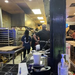 Dirty ceiling falling down in kitchen and food prep area , it has been like this for months please clean and fix