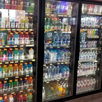 Speedy Stop - a refrigerated display of soft drinks - Car Wash Near Me - Manor, Texas