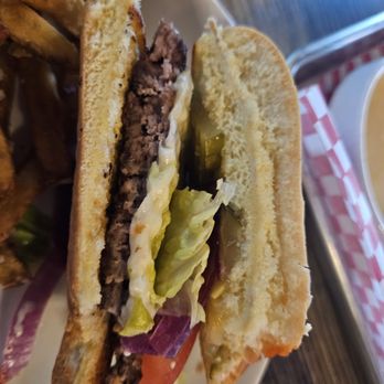 Off 87 - $17 Off 87 burger. Patty is barely thicker than paper and so overdone. No condiments on the burger at all. I couldn't get past 2 bites. - Themed Cafes Near Me - Chandler, Arizona