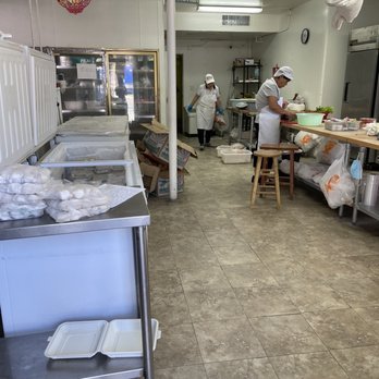 Dumpling City - workers working in a commercial kitchen - Shanghainese Near Me - Palo Alto, California Dumpling City - workers working in a commercial kitchen - Shanghainese Near Me - Palo Alto, California