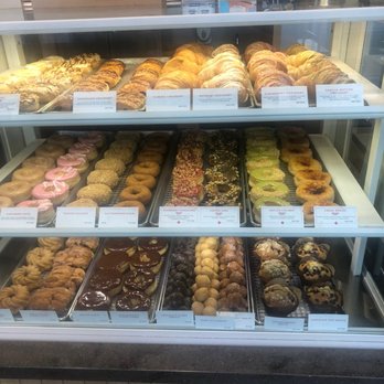 Tim Hortons - a display case full of donuts - Coffee & Tea Near Me - Toronto, Ontario Tim Hortons - a display case full of donuts - Coffee & Tea Near Me - Toronto, Ontario