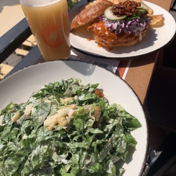 Cinderlands Warehouse - Caesar salad and chicken sandwich in the back - Full Squish IPA - Breweries Near Me - Pittsburgh, Pennsylvania