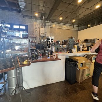 Smoky Hollow Roasters - Front counter with the menus and all the pastries on display - Coffee Roasteries Near Me - El Segundo, California