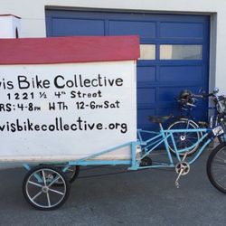 Davis Bike Collective - The sign welcoming people. Note: this is an older pic, so the hours are not accurate.