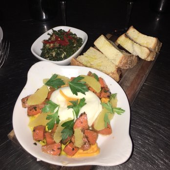 The Backspace - AMAZING burrata appetizer with roasted carrots, orange & warm focaccia. Also side of braised greens. - Italian Near Me - Austin, Texas