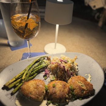 Tommy Bahama - Crab cake entree with slaw and grilled asparagus - Seafood Near Me - Sandestin, Florida Tommy Bahama - Crab cake entree with slaw and grilled asparagus - Seafood Near Me - Sandestin, Florida