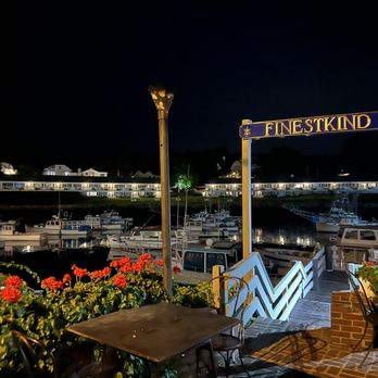 Barnacle Billy's - a view of a marina at night - Seafood Near Me - Ogunquit, Maine