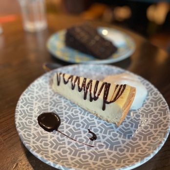 Nando's Peri-Peri - Cheesecake and double chocolate cake - Chicken Shop Near Me - Edmonton, Alberta Nando's Peri-Peri - Cheesecake and double chocolate cake - Chicken Shop Near Me - Edmonton, Alberta