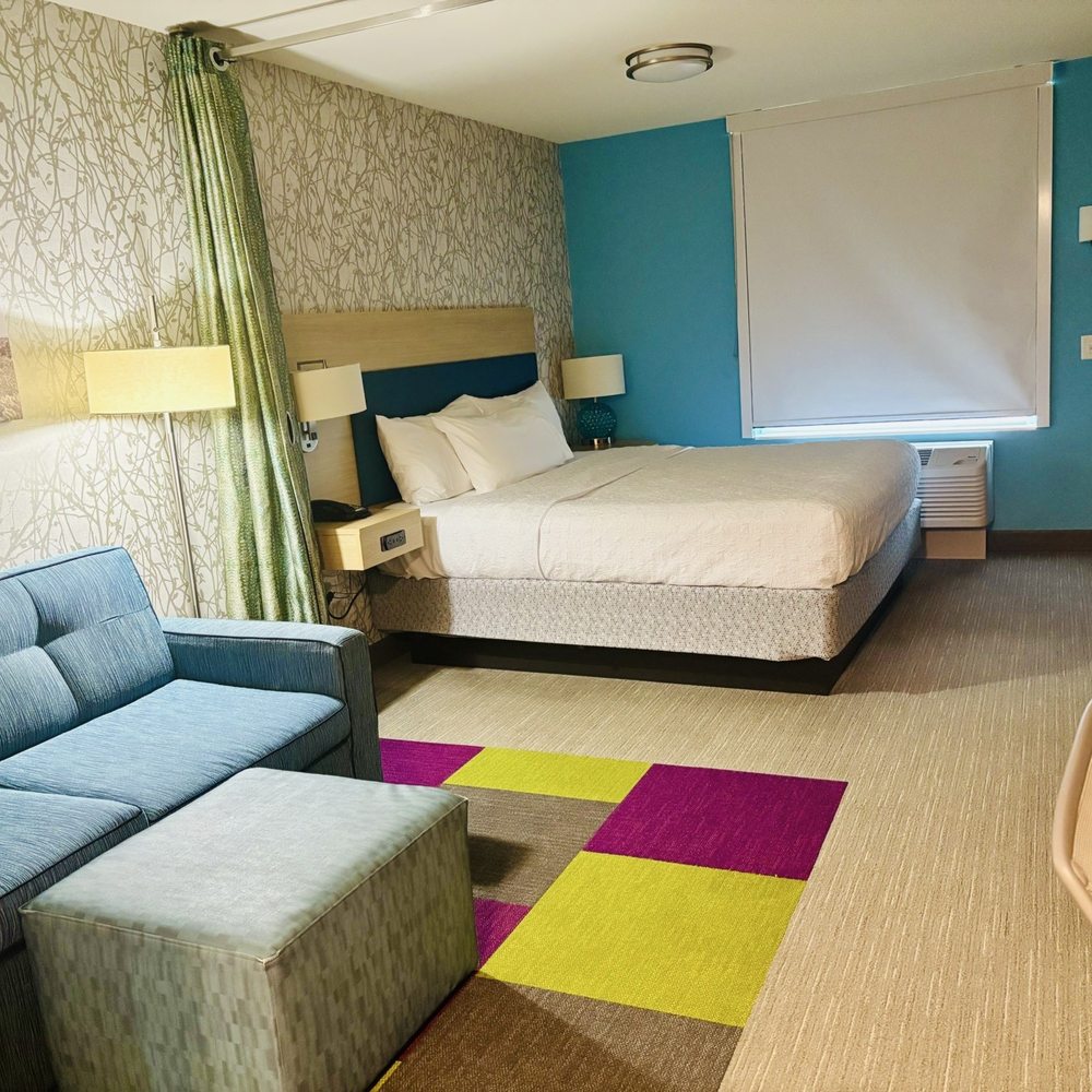 Home2 Suites by Hilton Buckeye Phoenix - Spacious room with separate seating area - Hotels Near Me - Buckeye, Arizona Home2 Suites by Hilton Buckeye Phoenix - Spacious room with separate seating area - Hotels Near Me - Buckeye, Arizona