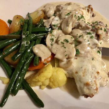 Villa Risi - Veal stuffed with cheese and topped with mushrooms in cream, vegetable and potato side - Restaurants Near Me - Newmarket, Ontario