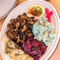 Sumac - chicken shawarma with two side salads $23 CAD