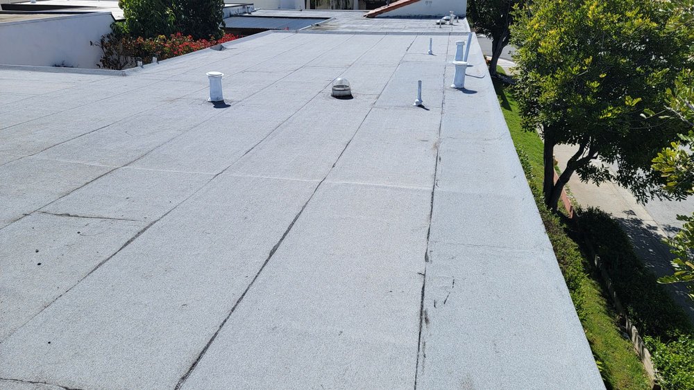 Slide of Husky Roofing