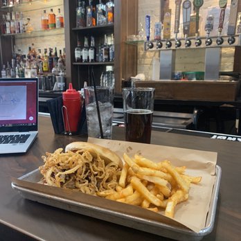 Doc's Bourbon Room - Pulled pork sandwich with onion shreds and fries - Whiskey Bars Near Me - Louisville, Kentucky