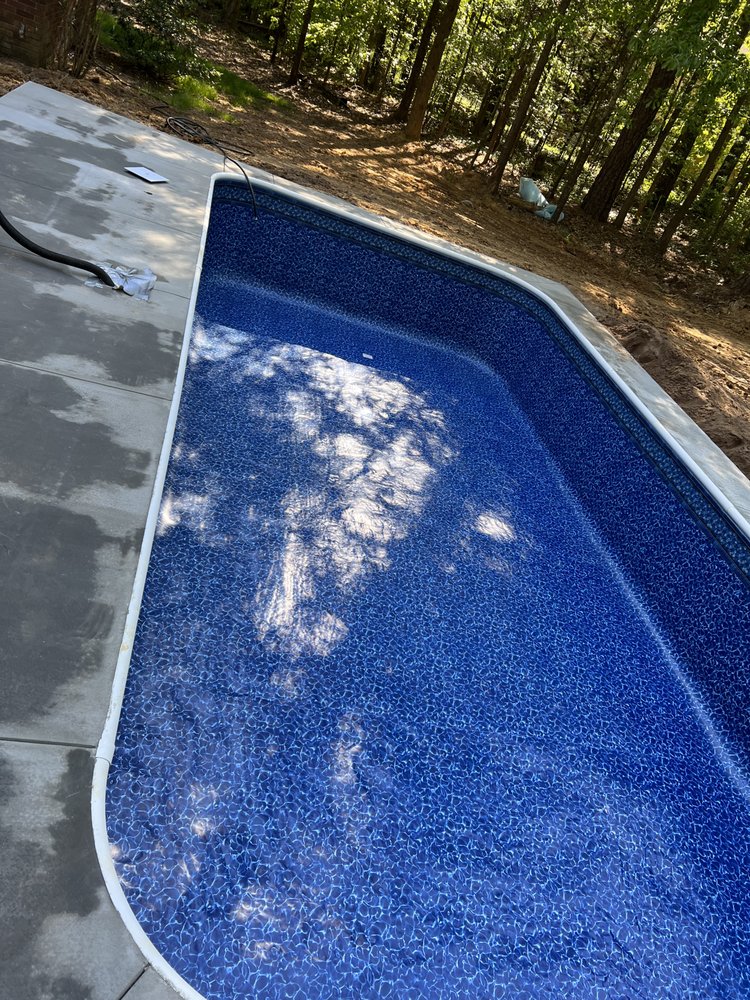 Packs Pools and Construction Logo