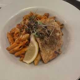Pan seared Halibut on a penne tomato base with chilli flakes Pan seared Halibut on a penne tomato base with chilli flakes