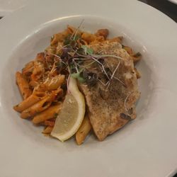 Oliver's - Pan seared Halibut on a penne tomato base with chilli flakes