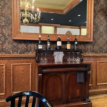 Figaro the Dining Room - a table with wine glasses on it - New American Near Me - Newberry, South Carolina