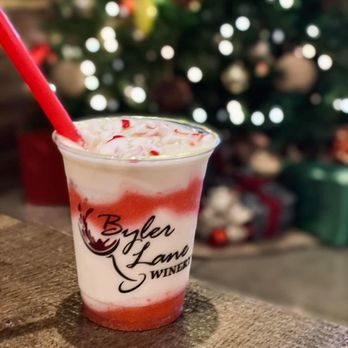 Byler Lane Winery - a drink in front of a christmas tree - Wineries Near Me - Auburn, Indiana Byler Lane Winery - a drink in front of a christmas tree - Wineries Near Me - Auburn, Indiana