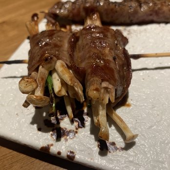 Shinya Shokudo - Wagyu Sukiyaki - enoki mushroom and Japanese mustard wrapped in American wagyu with tare sauce or truffle salt. So good. - Izakaya Near Me - Seattle, Washington Shinya Shokudo - Wagyu Sukiyaki - enoki mushroom and Japanese mustard wrapped in American wagyu with tare sauce or truffle salt. So good. - Izakaya Near Me - Seattle, Washington