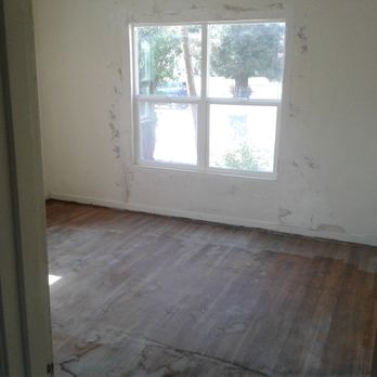DL Floor - BEFORE - Massive stains - Bedroom 1 - Flooring Near Me