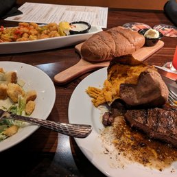 Newyork strip, sweet potato, Caeser salad. Appetizer wild west shrimp. Drink: Strawberry Lemonade