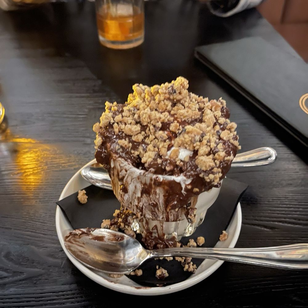 The Botanist - Soo good 10/10! - Vanilla ice cream topped w/cookie crumble & nutella! - Cocktail Bars Near Me - Bakersfield, California The Botanist - Soo good 10/10! - Vanilla ice cream topped w/cookie crumble & nutella! - Cocktail Bars Near Me - Bakersfield, California