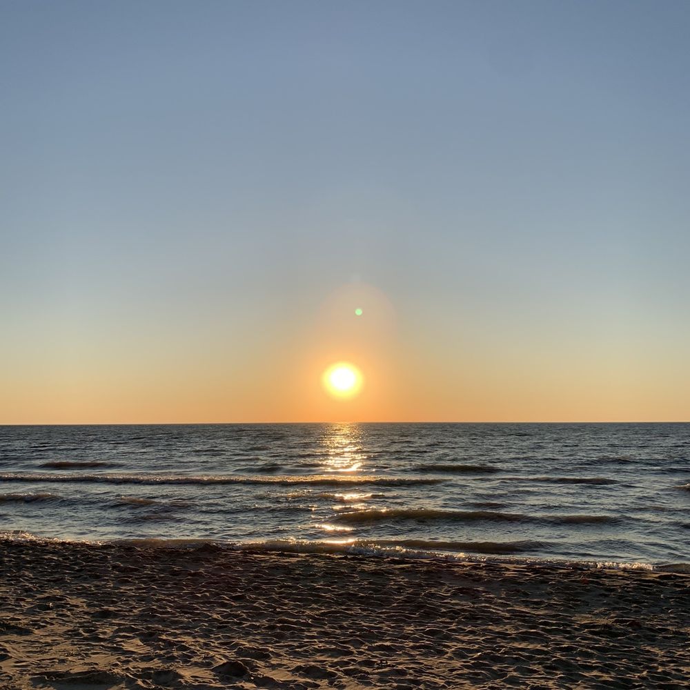 Oval Beach - Sat down to enjoy the sunset over Lake Michigan - Beaches Near Me - Saugatuck, Michigan