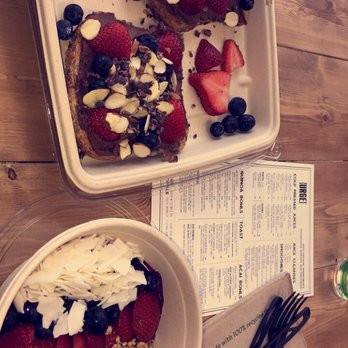 Urge Juice - Dragonfruit based bowl w/strawberries coconut chips and granola - Juice Bars & Smoothies Near Me - Berkley, Michigan