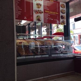 Mega Pizza - Their pizza display you can choose from - Pizza Near Me - Miami Beach, Florida Mega Pizza - Their pizza display you can choose from - Pizza Near Me - Miami Beach, Florida
