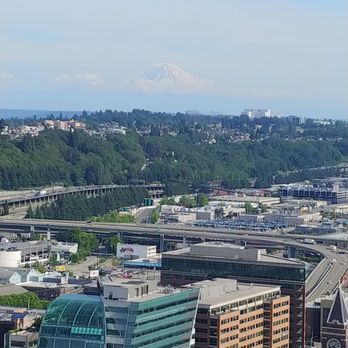 Smith Tower Observatory Bar - My. Rainier view from the observatory bar - Cocktail Bars Near Me - Seattle, Washington