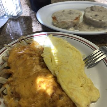 Mamas Kountry Kooking - Mama's super loaded hashbrown taters w/ onion, peppers, mushrooms, ham and cheese.  Grilled biscuit with gravy super good as well. - Breakfast & Brunch Near Me - Orangeburg, South Carolina