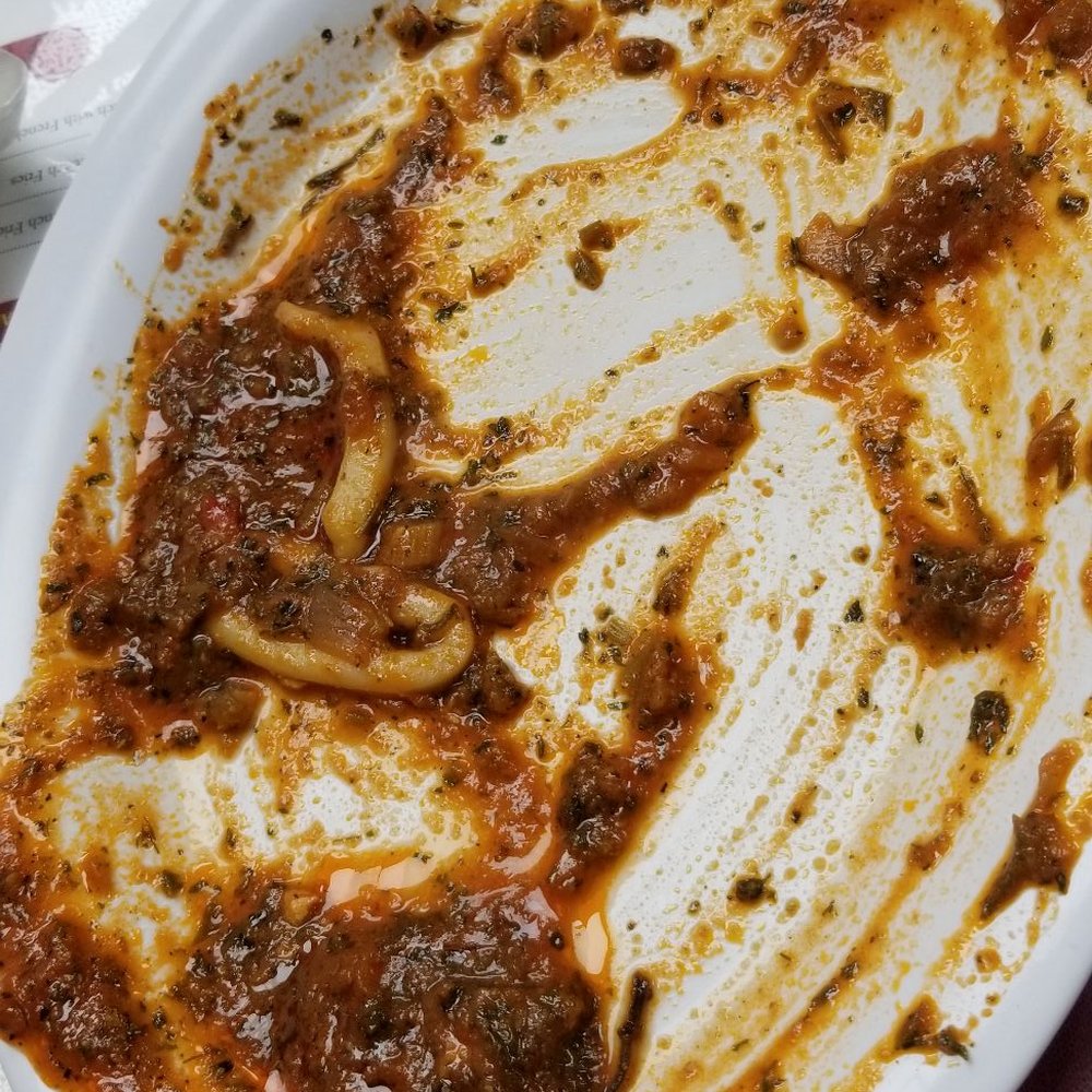 Samakmak Seafood - Calamari in tomato sauce! Soo good! - Mediterranean Near Me - Jersey City, New Jersey