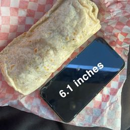 Burrito size compared to an iPhone 12 Pro Max. They lining might not be the best but u get an idea of the size. Burrito size compared to an iPhone 12 Pro Max. They lining might not be the best but u get an idea of the size.
