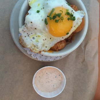 Rodeo Goat - Steaming pile (tator tots, goat cheese, truffle oil, fried egg, jalapeños) - Burgers Near Me - Dallas, Texas Rodeo Goat - Steaming pile (tator tots, goat cheese, truffle oil, fried egg, jalapeños) - Burgers Near Me - Dallas, Texas