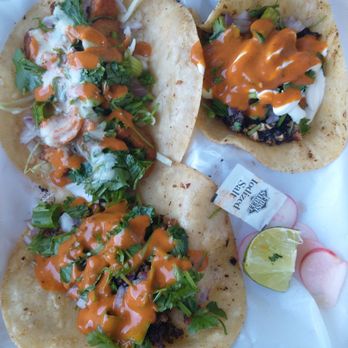 Desi food shop - In the photo is the vegan taco (lower left), chunks of soy taco (upper left) and cauliflower taco (upper right). - Indian Near Me - Bakersfield, California Desi food shop - In the photo is the vegan taco (lower left), chunks of soy taco (upper left) and cauliflower taco (upper right). - Indian Near Me - Bakersfield, California