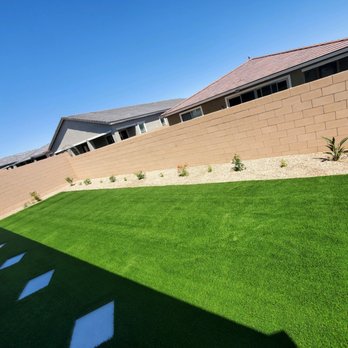 EG Landscape - a backyard with artificial grass - Landscaping Near Me