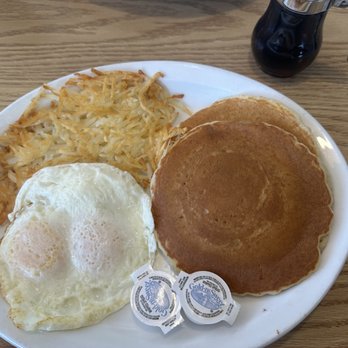 America's Kitchen - 2 eggs over easy with hash browns and 2 pancakes - Breakfast & Brunch Near Me - Galveston, Texas America's Kitchen - 2 eggs over easy with hash browns and 2 pancakes - Breakfast & Brunch Near Me - Galveston, Texas