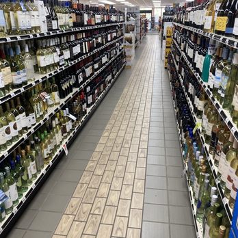 bp - rows of wine bottles - Gas Stations Near Me - Woodruff, Wisconsin