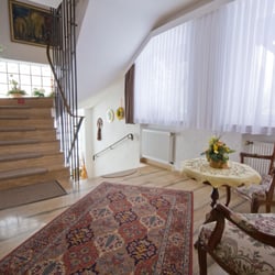 Gästehaus Nietmann Ferienwohnungen & Gästezimmer - Der Treppenaufgang zu den Gästezimmern