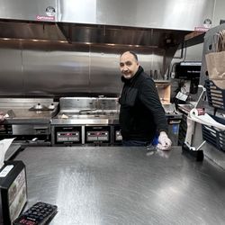 MOOYAH Burgers, Fries & Shakes - Ash the owner. Working hard for his customers.