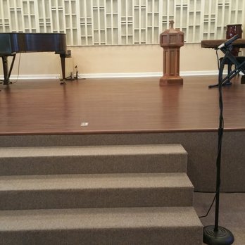 Lakeland Flooring - a stage with a piano and piano stand - Carpeting Near Me - Lakeland, Florida Lakeland Flooring - a stage with a piano and piano stand - Carpeting Near Me - Lakeland, Florida