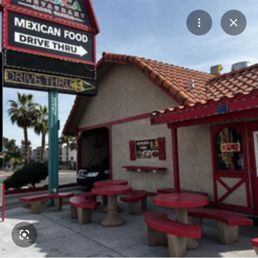 The exterior. The location is easy to find with plenty of parking and a drive through. The exterior. The location is easy to find with plenty of parking and a drive through.