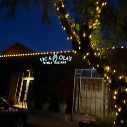 Exterior outside entrance of Vic & Ola's - View from parking lot - Scottsdale, Arizona Exterior outside entrance of Vic & Ola's - View from parking lot - Scottsdale, Arizona
