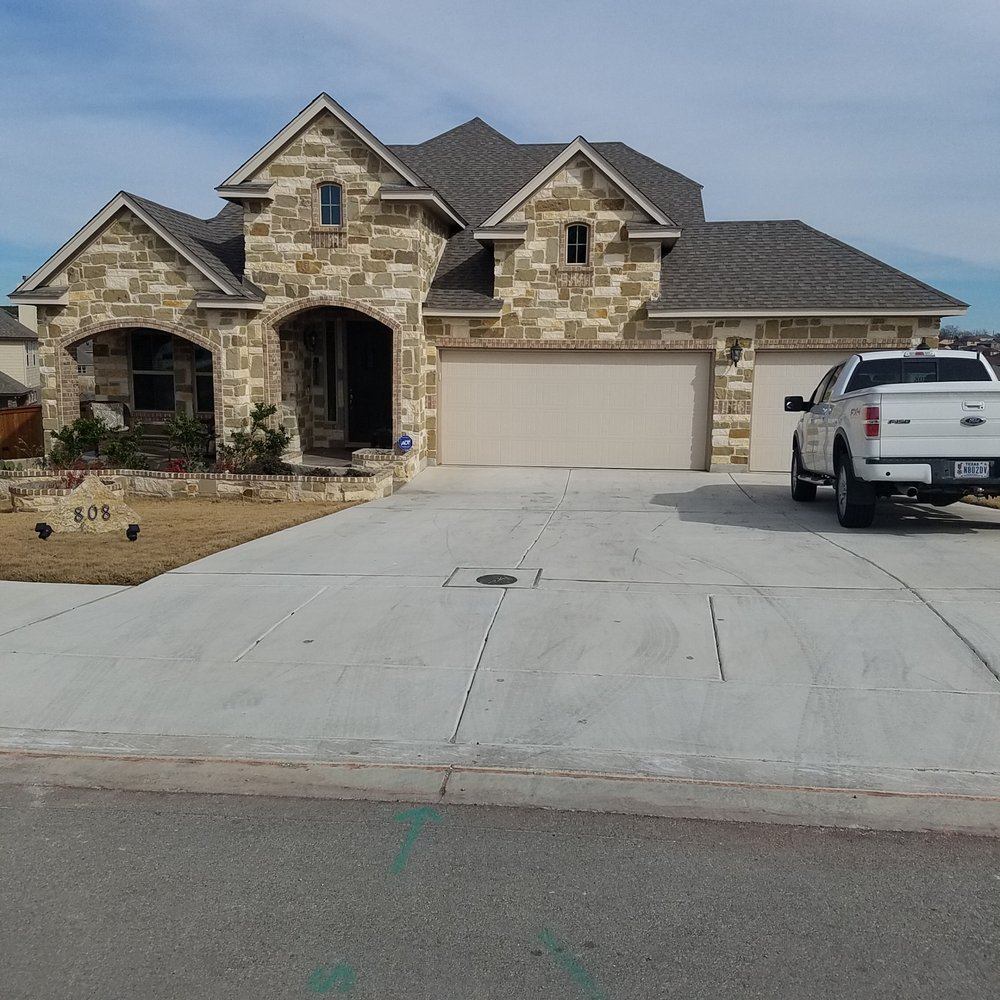 Slide of Roesler's Roofing & Remodeling