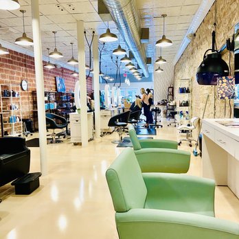 Razmataz Salon - Waiting area cute green chairs - Hair Salons Near Me - Georgetown, Texas