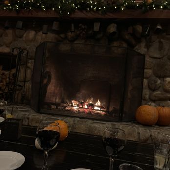 Cambria Pines Lodge Restaurant - Indoor lounge by the fireplace - American Near Me - Cambria, California Cambria Pines Lodge Restaurant - Indoor lounge by the fireplace - American Near Me - Cambria, California